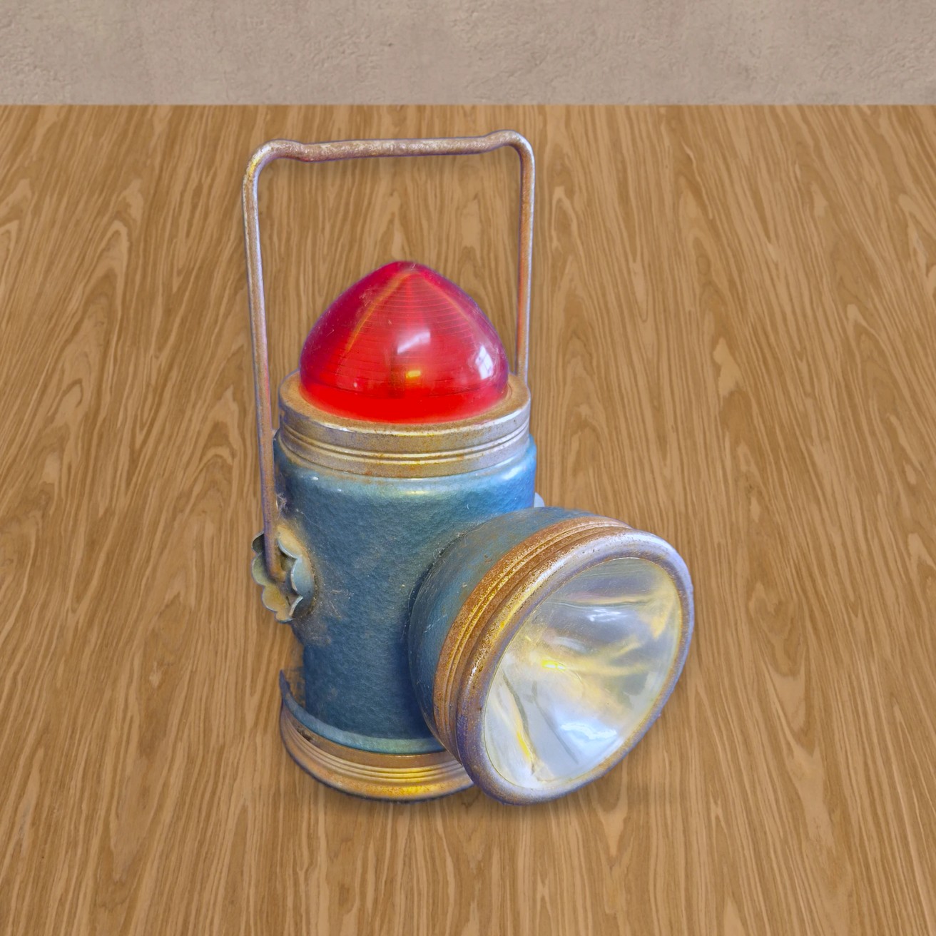 1960s battery lantern, blue metal with red dome
